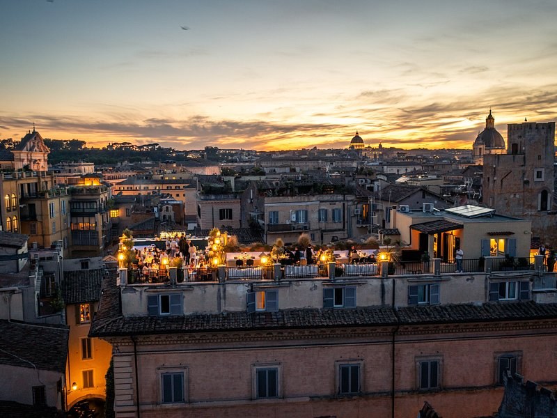 Rome's rooftops and domes at dusk